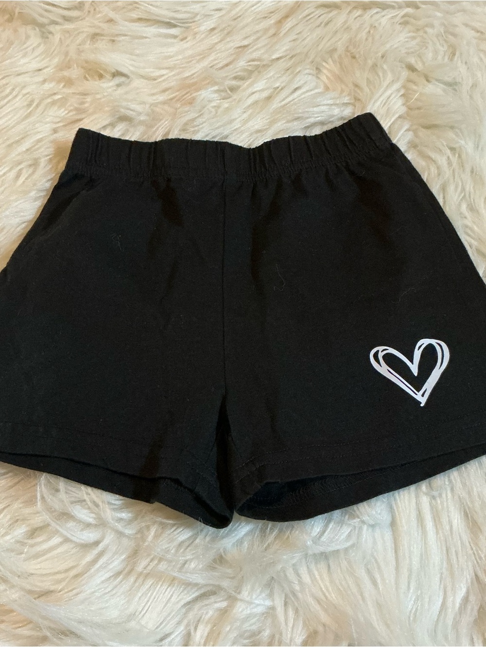 Size 110/4T black pull on shorts with white heart for girls